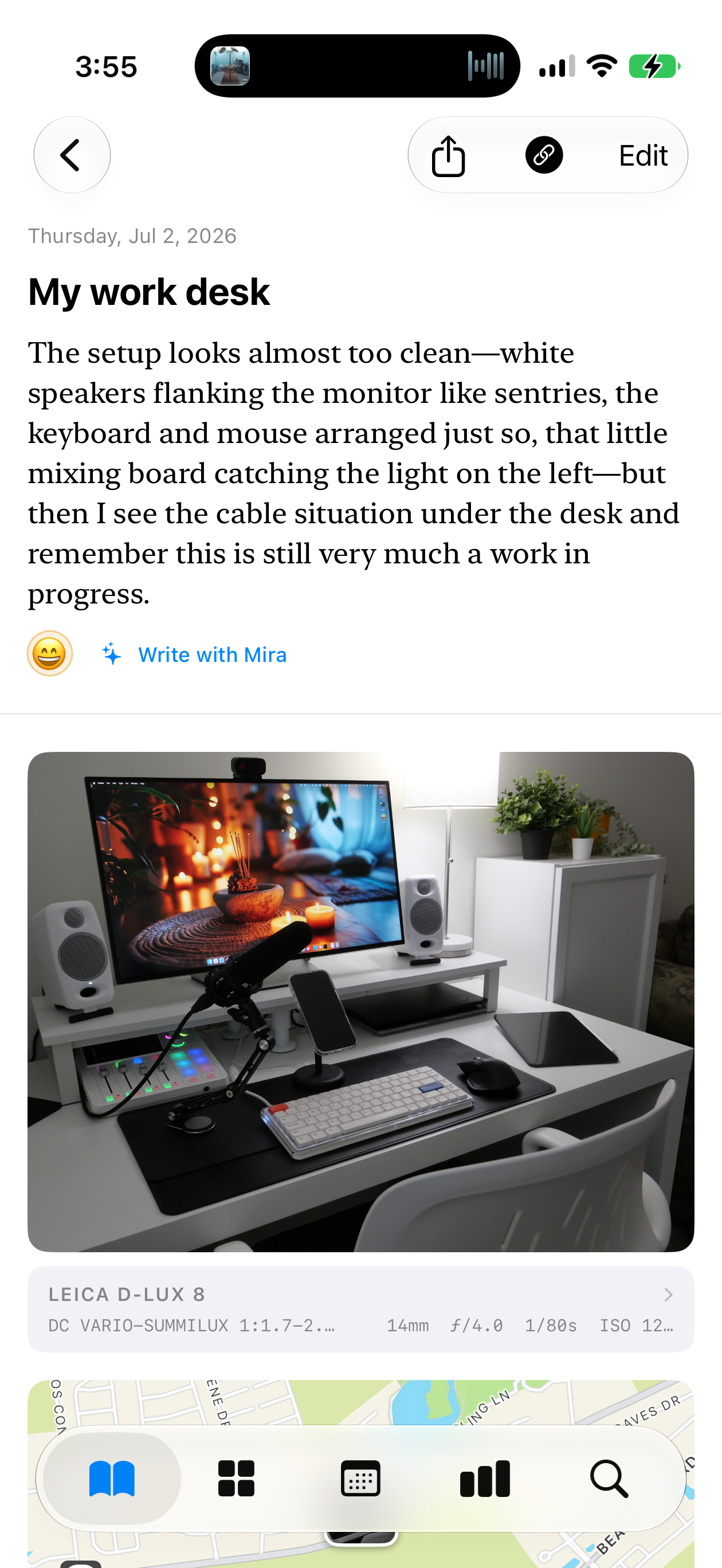 A diary entry of a desk setup, shot on a Leica D-Lux 8, written by Mira